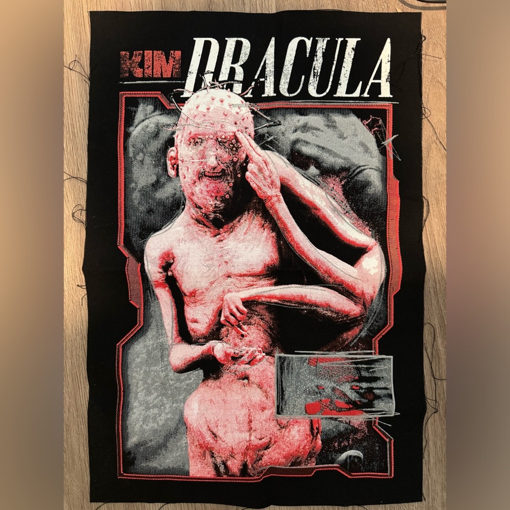 Kim Dracula Laminate w/ lanyard.